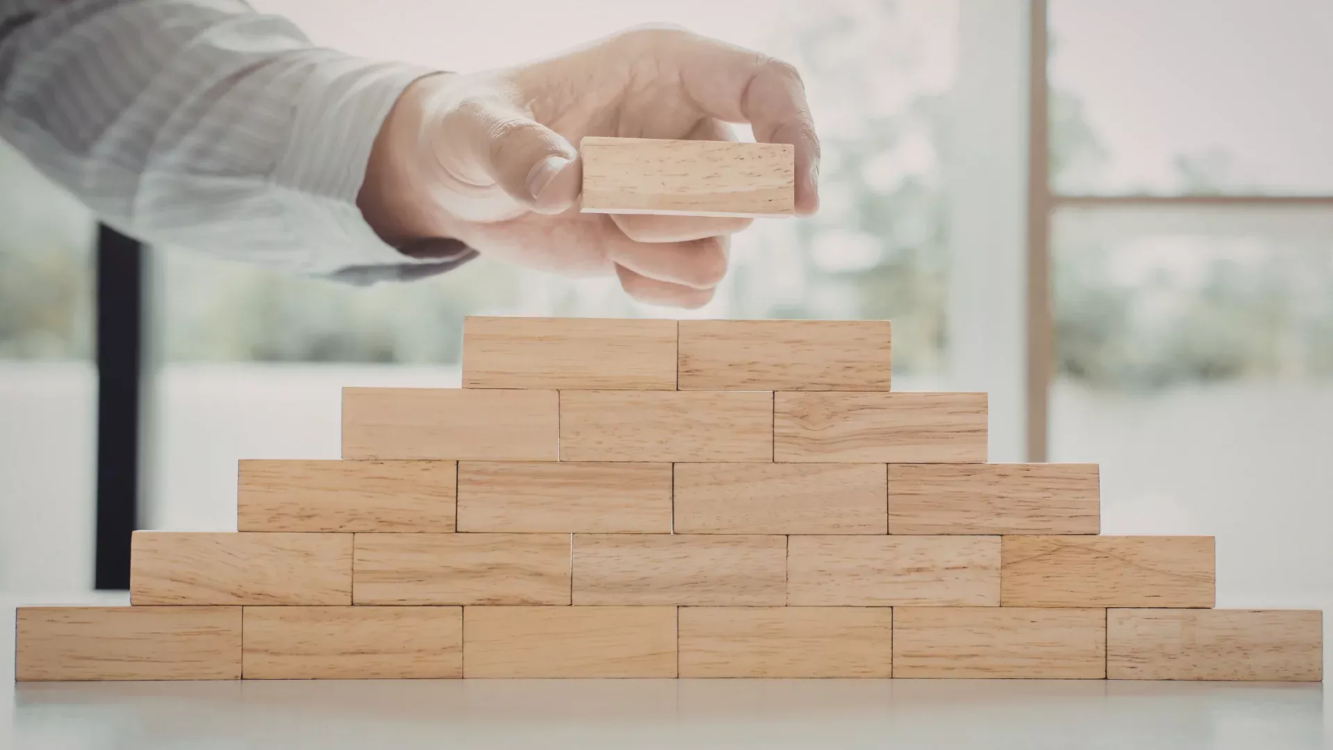Hand assembling building blocks